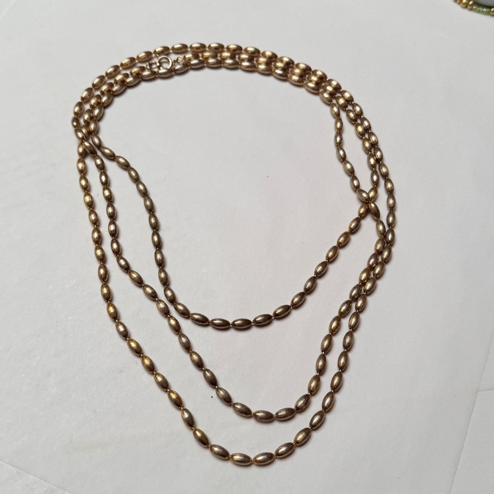 Vintage Gold Tone Long Strand Textured Rice Bead Necklace 64 Inch Layering
